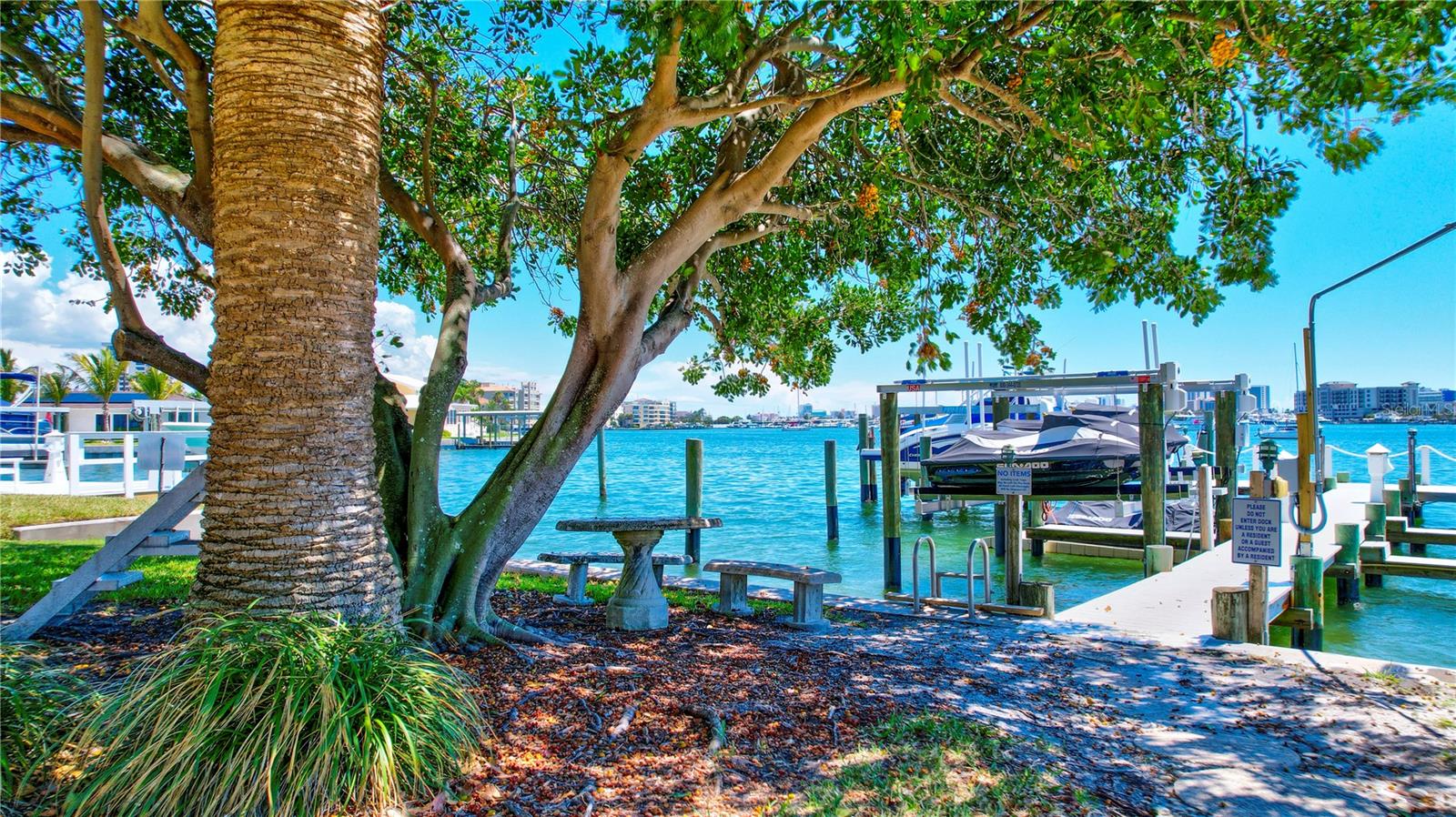 Convenient pathways lead directly from the condo to the dock and boat slips, ensuring easy access for residents.