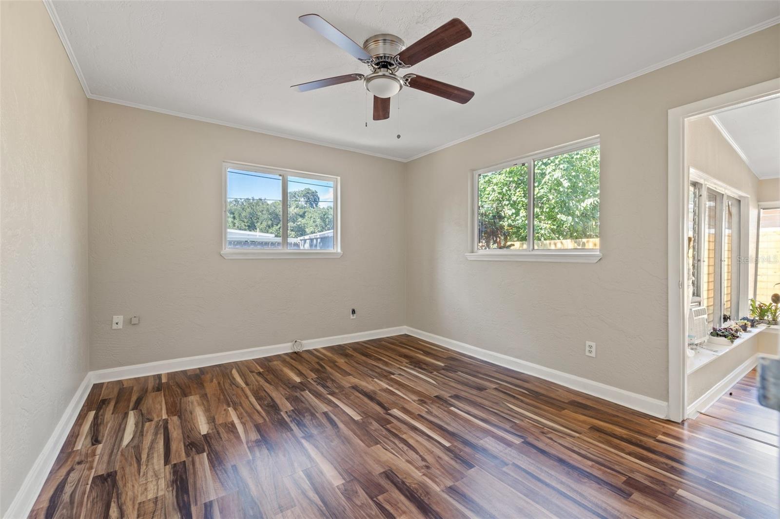 3rd bedroom with access to sun porch.