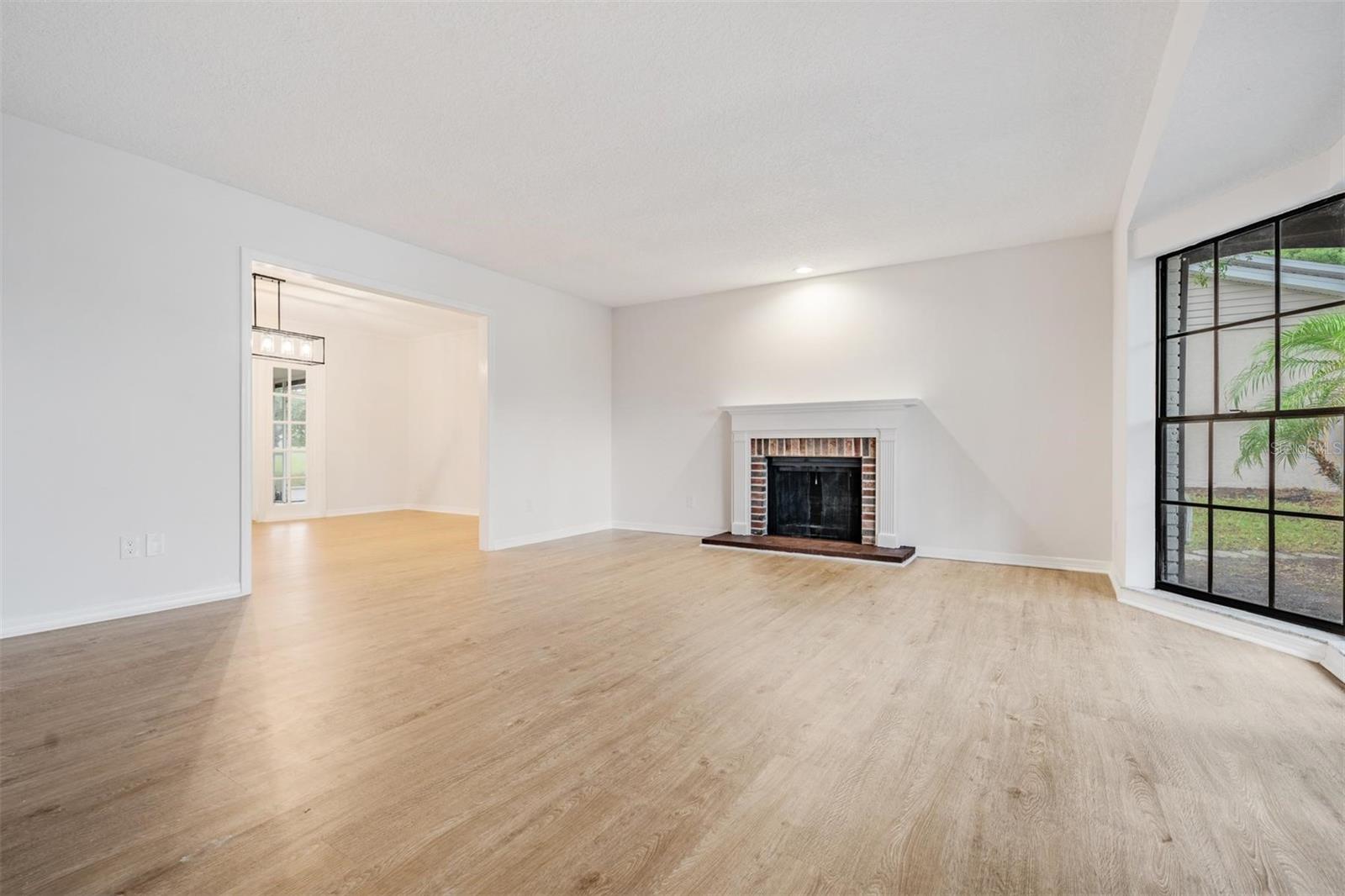 Living room with wood-burning fireplace