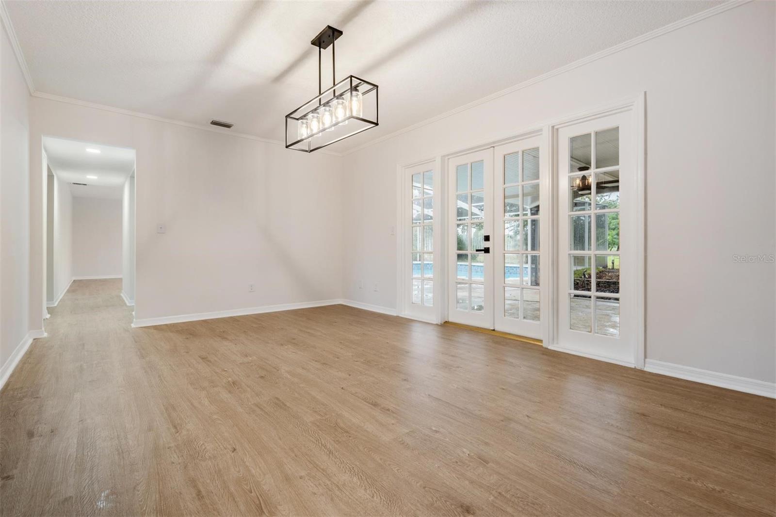 Formal dining room with slider to covered patio