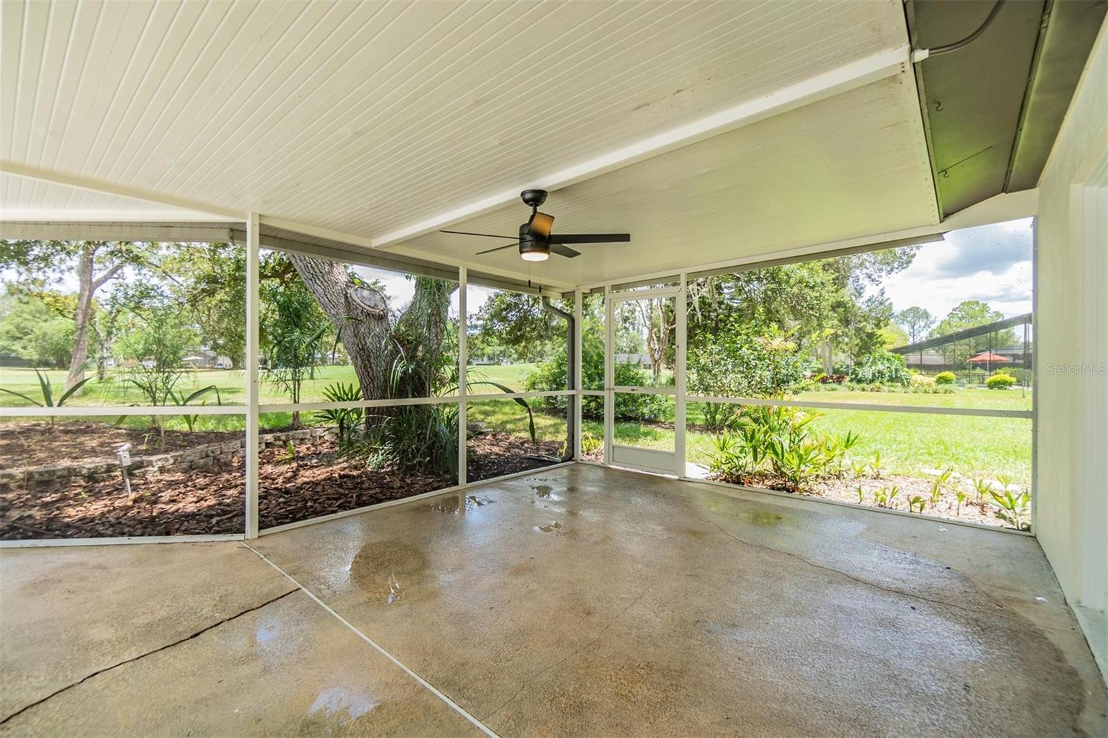 Looking toward covered patio and golf course