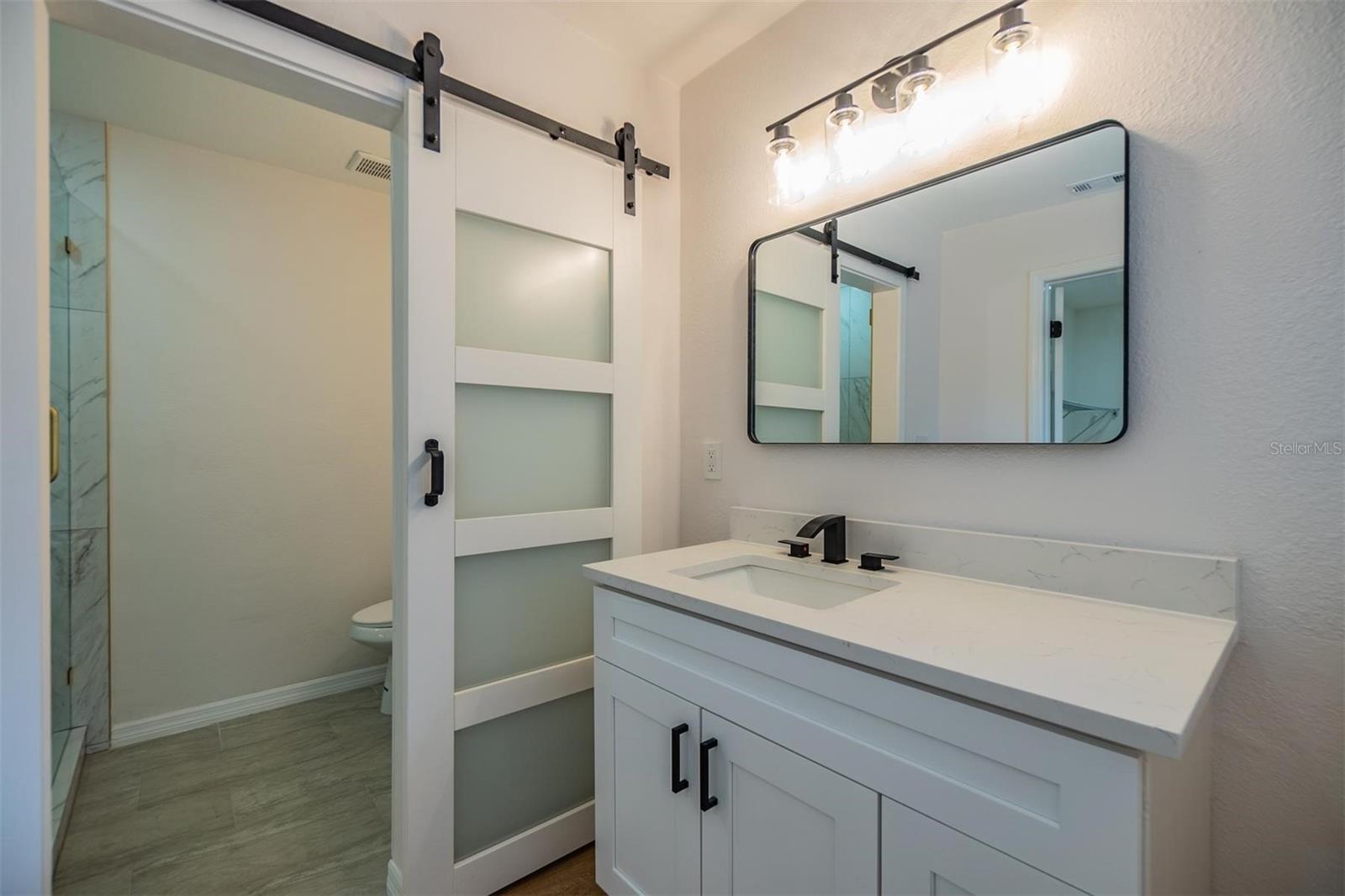 One of two vanities in primary bathroom