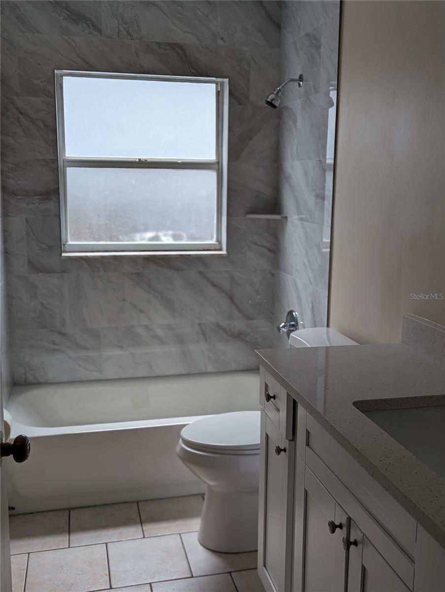 Hall bathroom updated with quartz countertop!