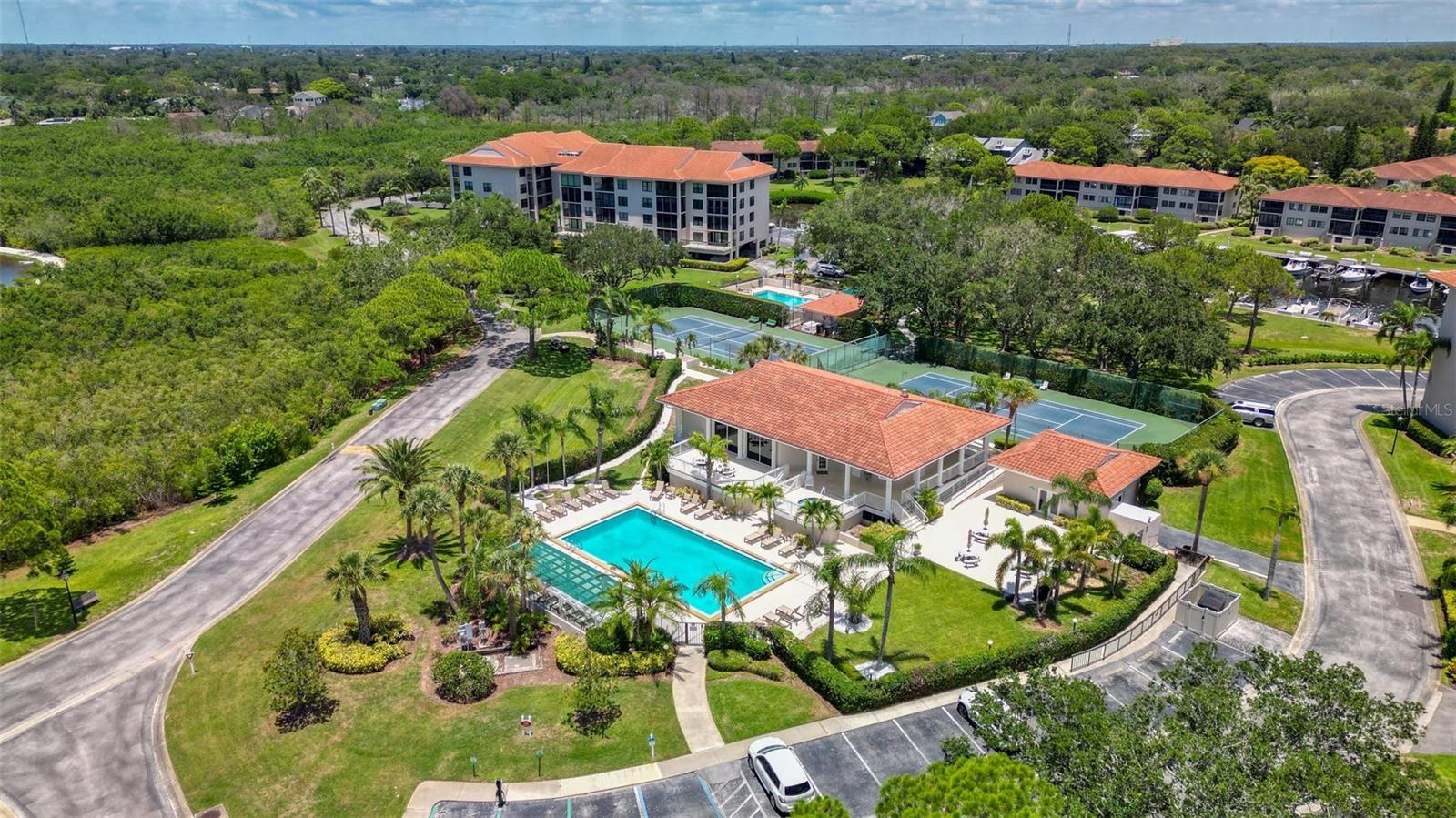 Tarpon Cove Pool, Clubhouse, Grilling Area, Tennis Courts and Gym!