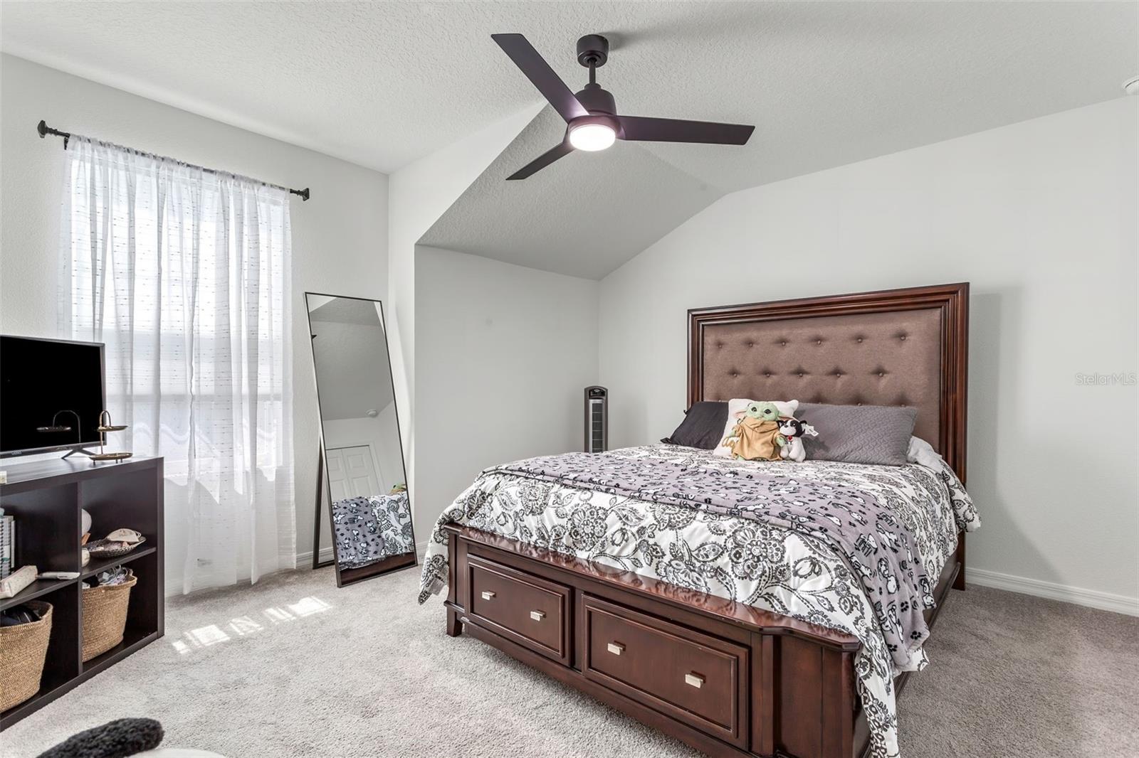 Bedroom 2 with standard closet and huge window for maximum light during the day.