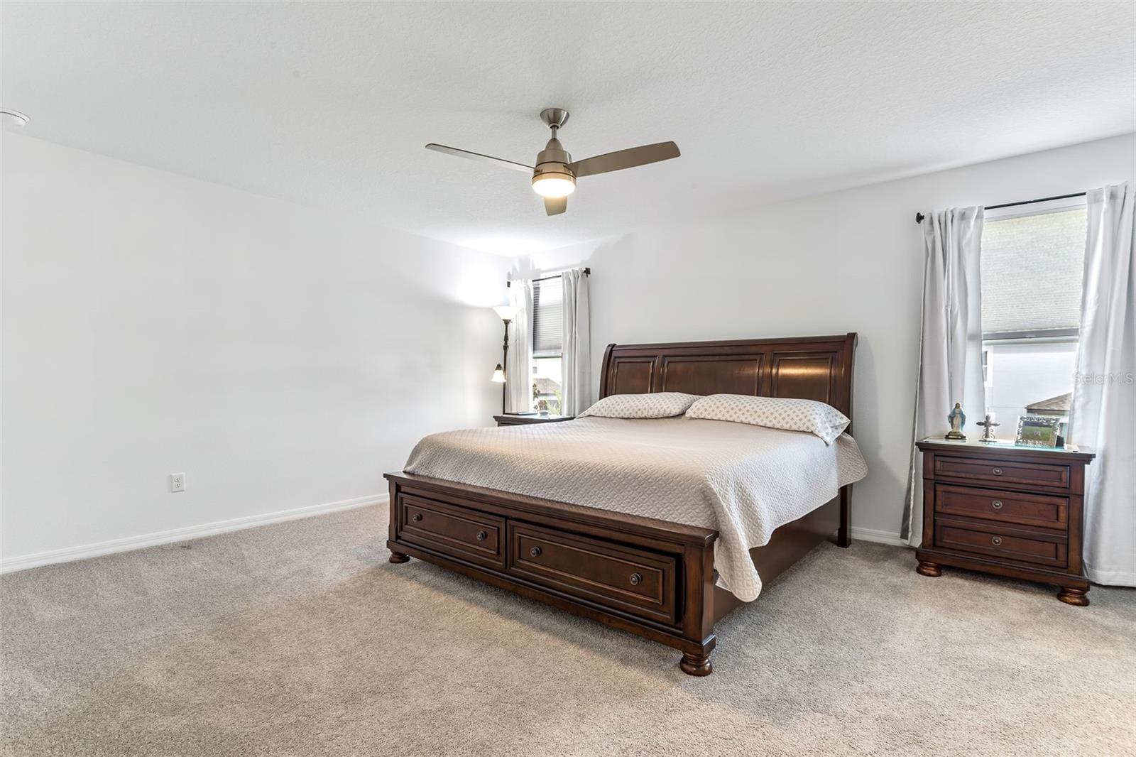 The primary bedroom is HUGE with tons of potential for a king bed and separate seating or vanity area.