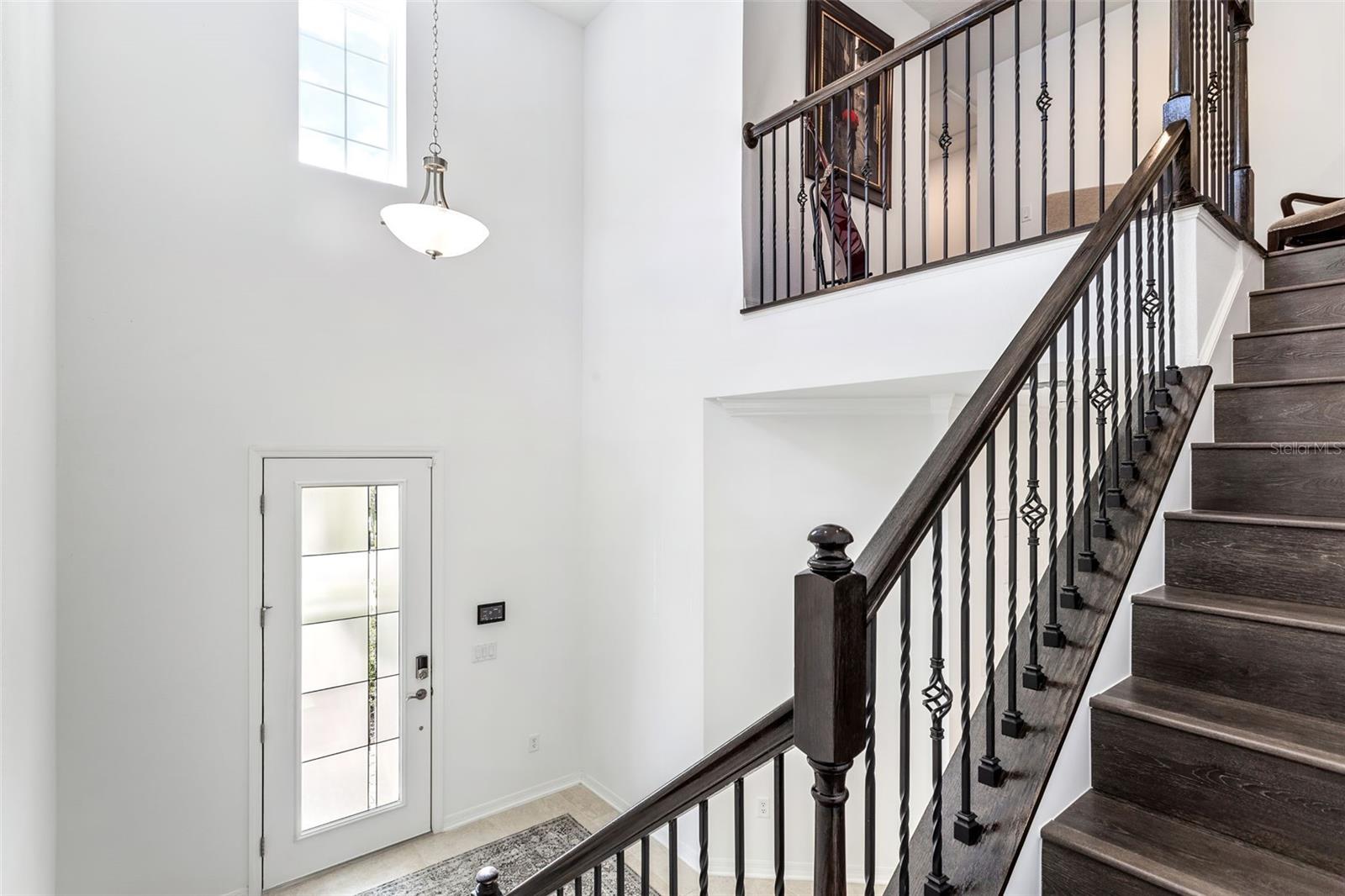 Tons of windows and light come into this property, the open entryway gives it a huge and tall feeling upon entry.