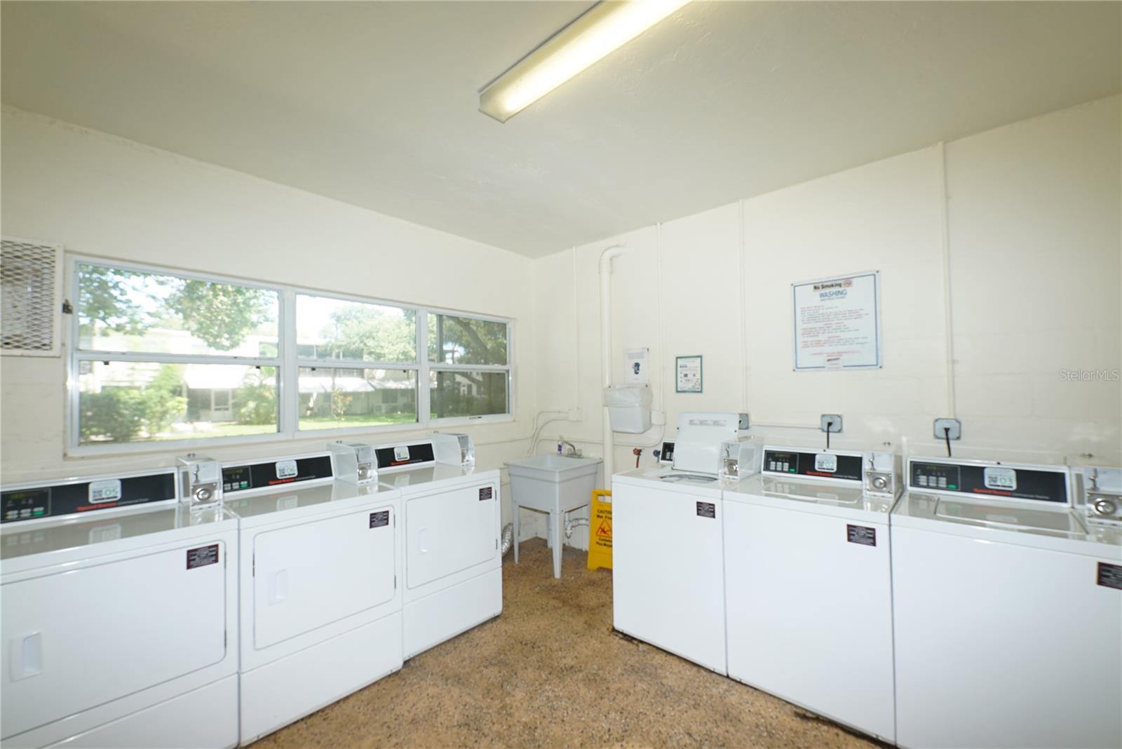 Air-Conditioned Laundry room in the same building