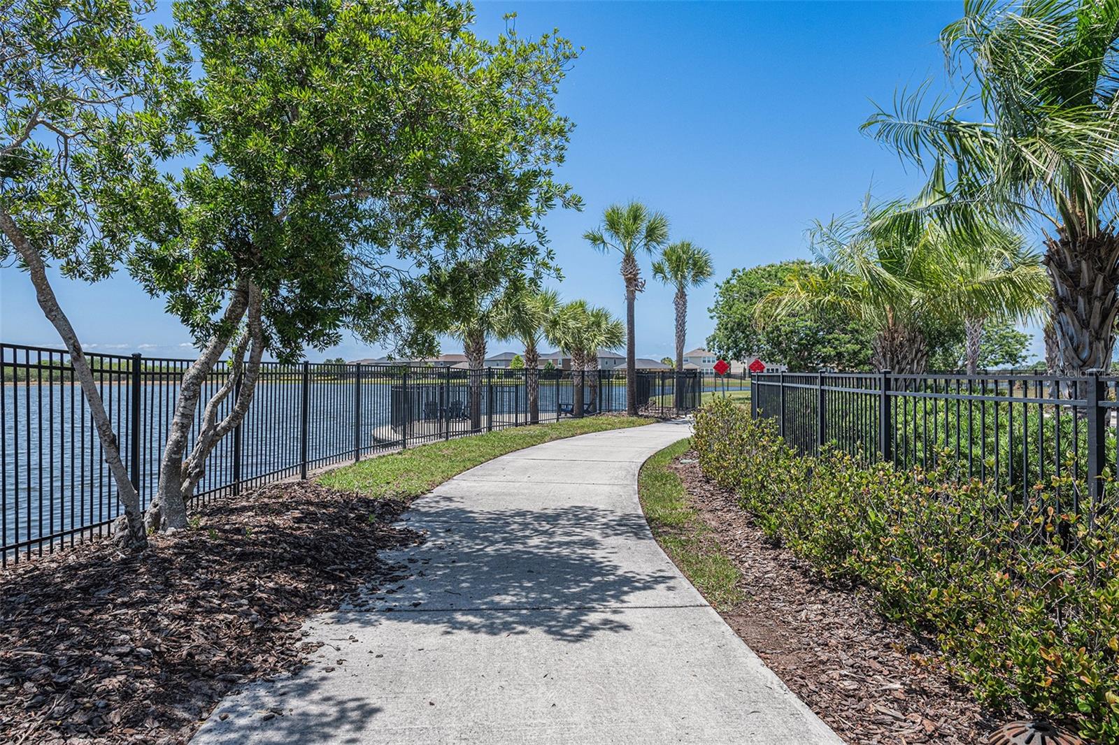 Two pools, tennis courts, basketball courts, fishing ponds, and a dog park and miles of scenic walking trails.