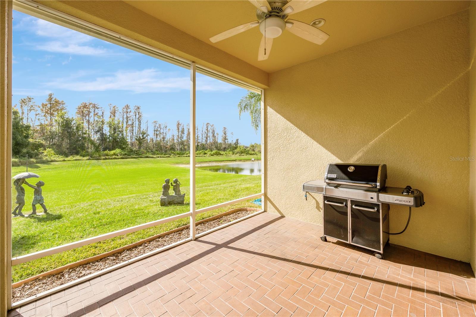 Screened in back patio with conservation views