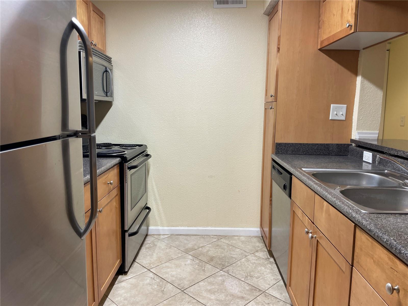 Galley kitchen with stainless steel