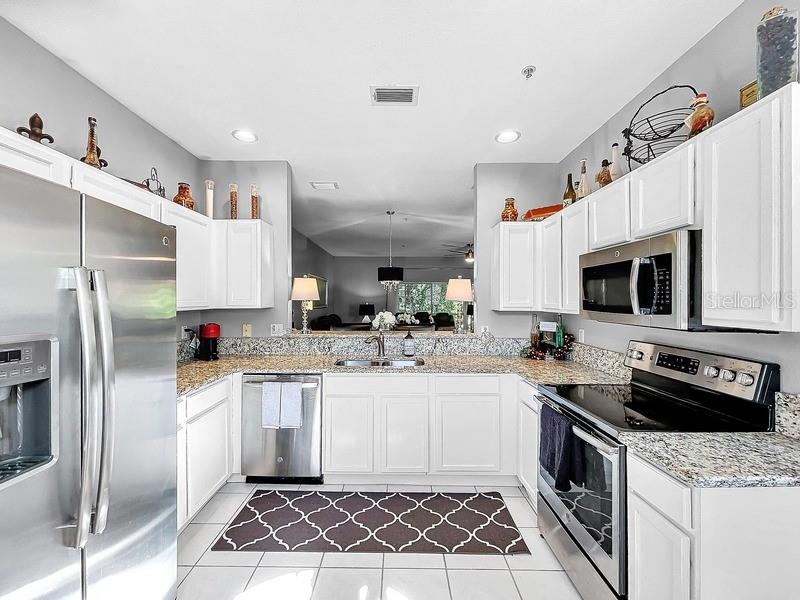 Kitchen Has Stainless Steel Appliances, and Solid Wood Cabinets