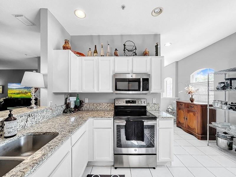 Kitchen Has Stainless Steel Appliances, and Solid Wood Cabinets