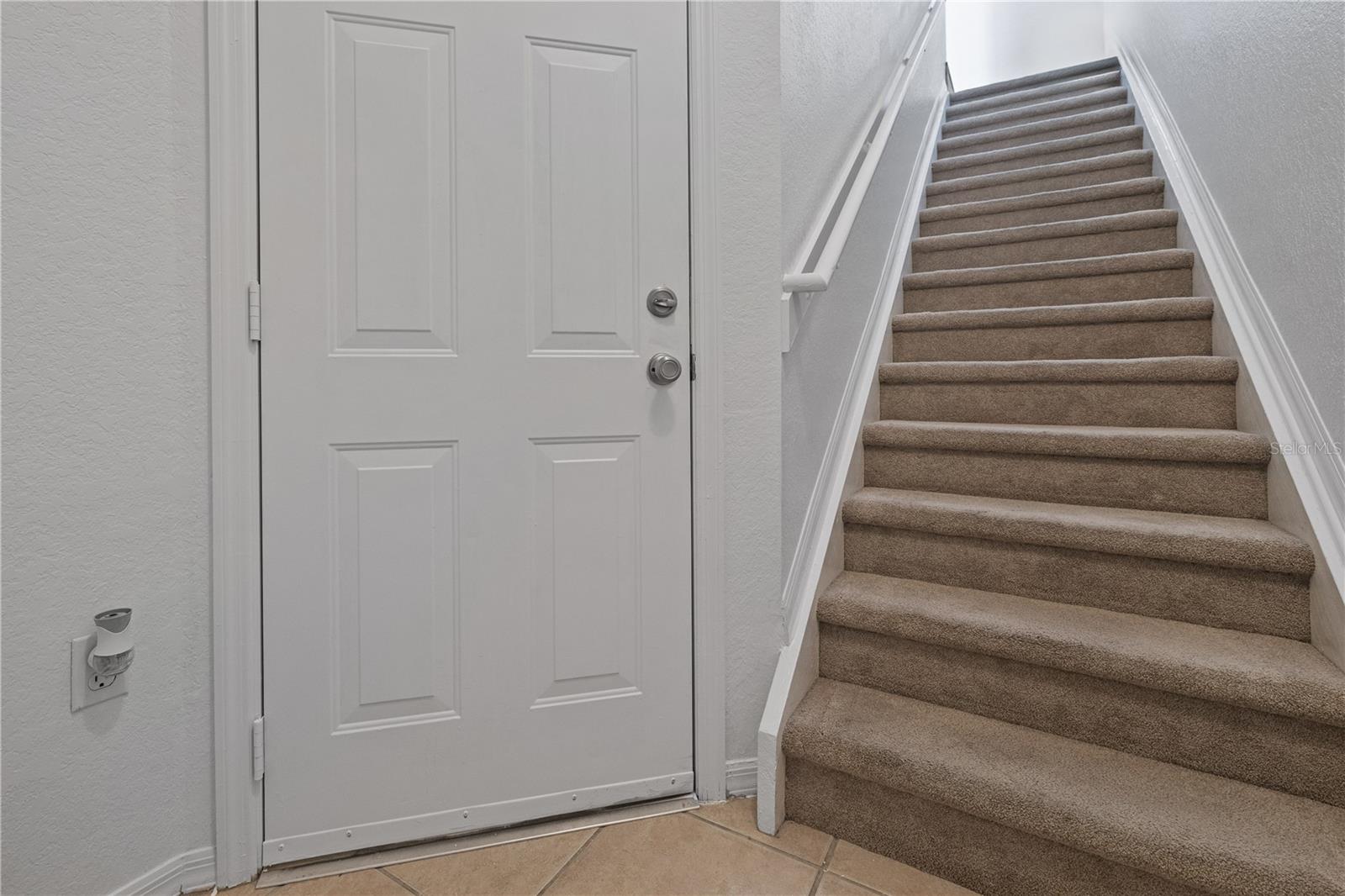 Foyer with door to garage