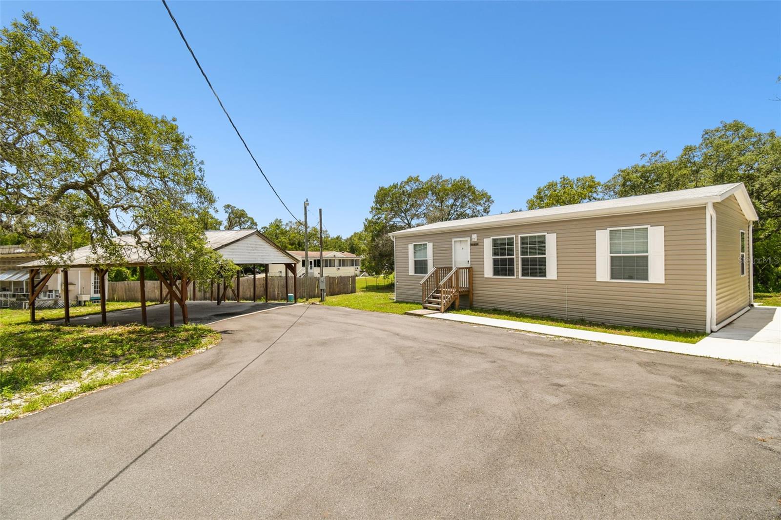 Long Asphalt Driveway & Concrete Walks 2022