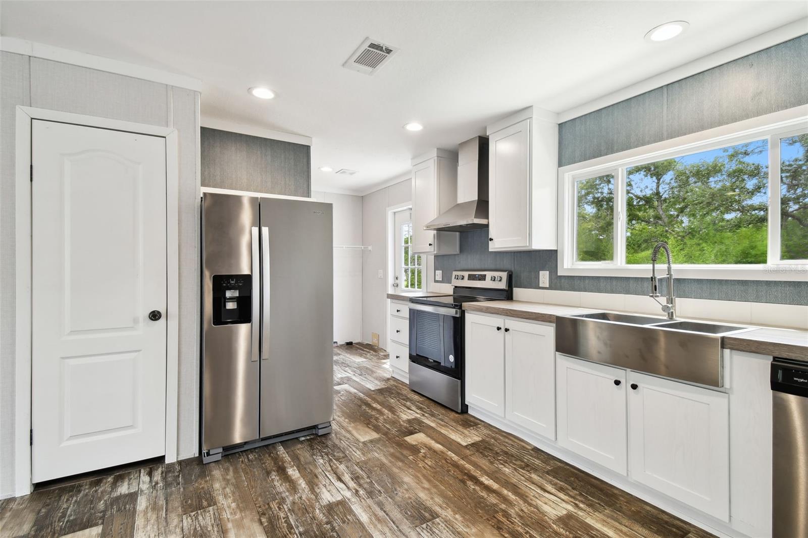 Stainless Steel Appliances And Drop-In Sink