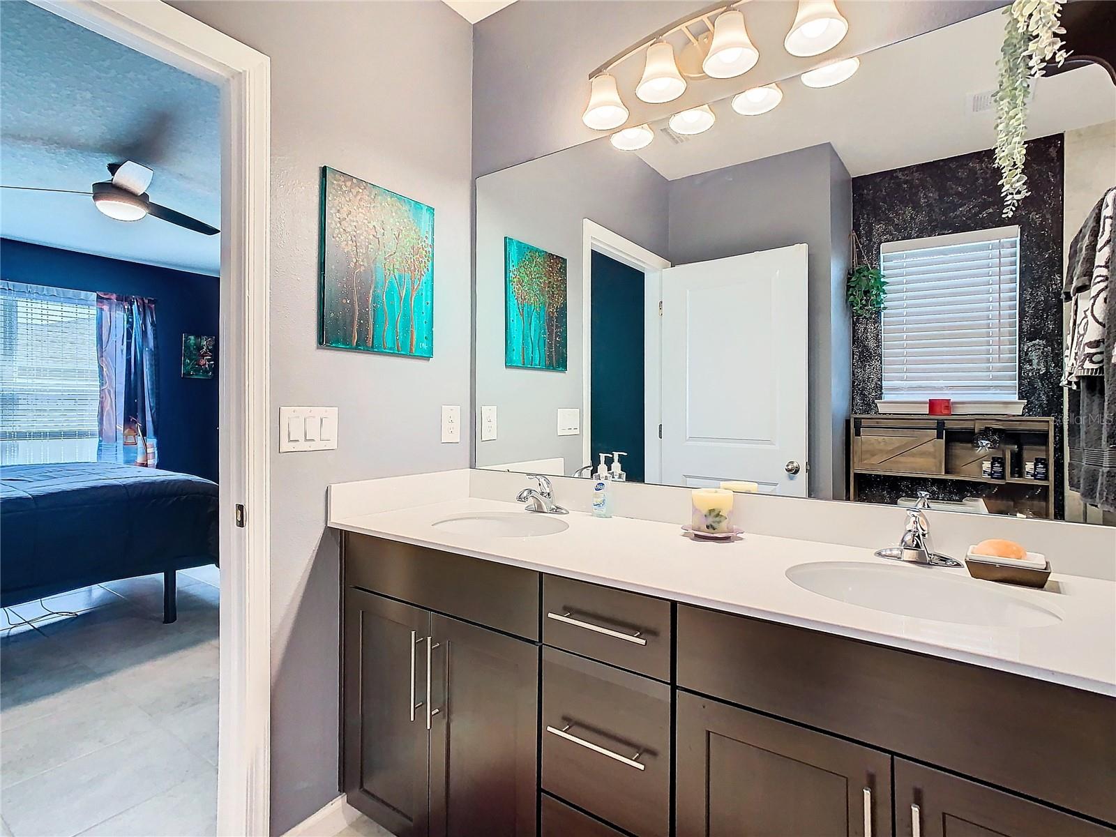 Ensuite bathroom with dual vanities