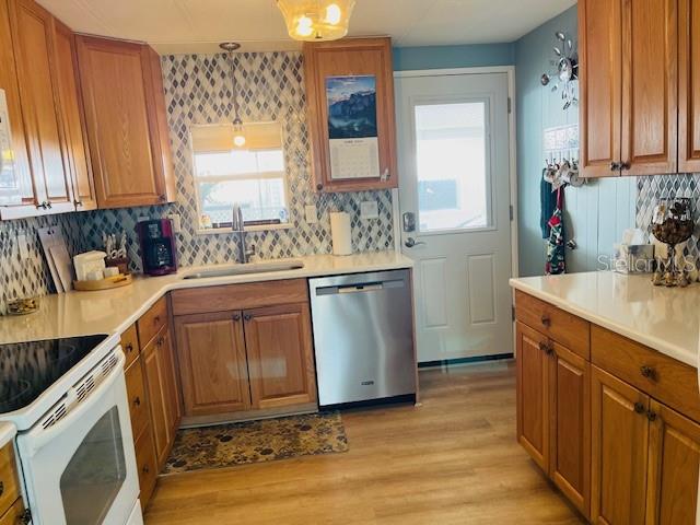 Kitchen leads to side door and carport