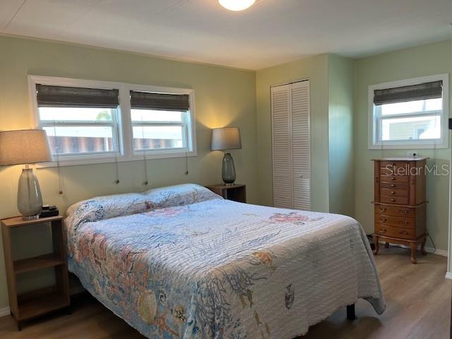 Primary bedroom with two single closets plus one walk-in closet.