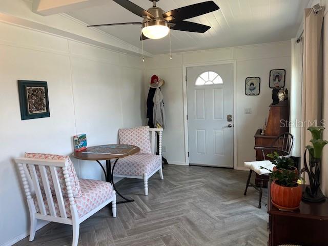 Beautifully tiled and airconditioned enclosed porch living area.