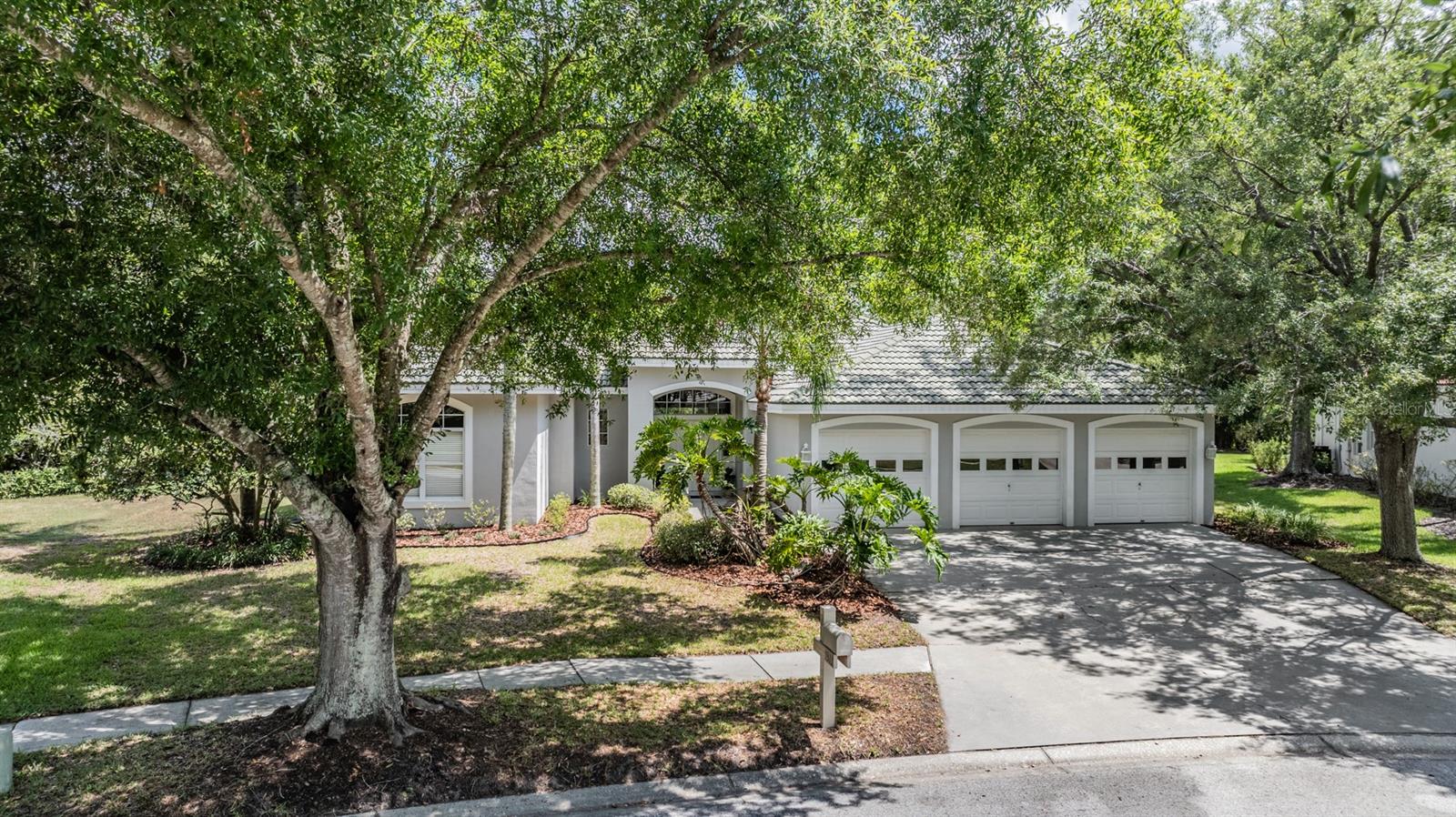 Front Exterior - 4 bedrooms/3 bathrooms/3 car garage on a conservation lot.