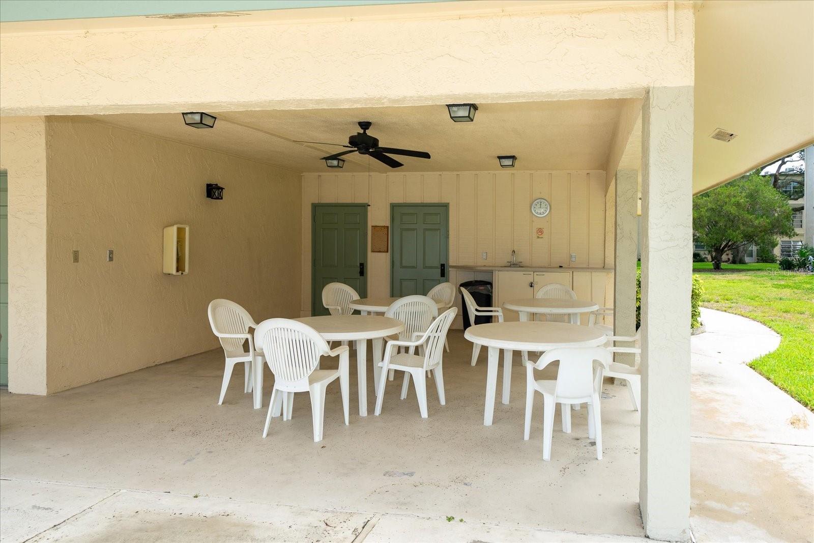 Shaded sitting area and outdoor bathrooms