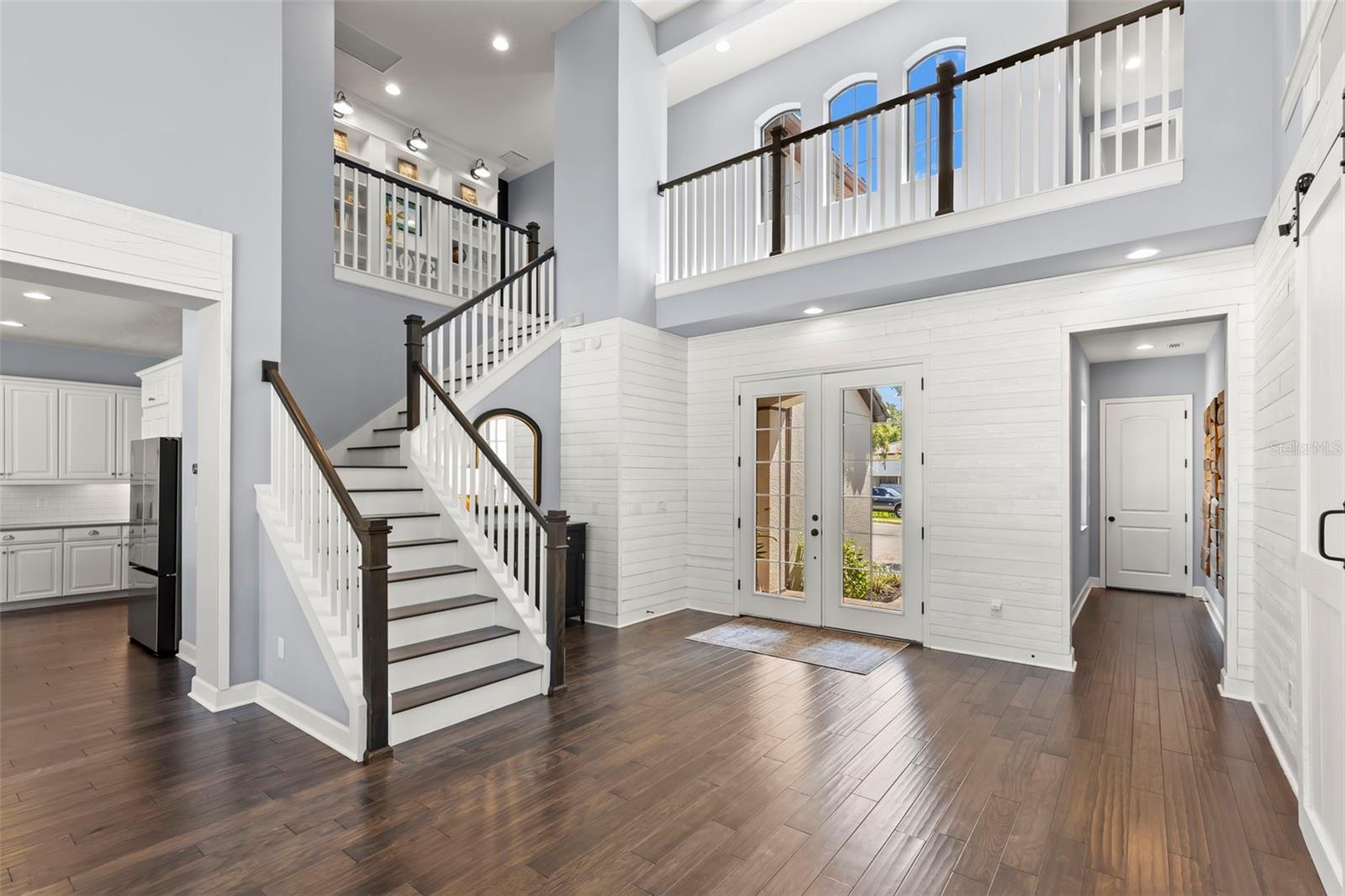 2-story soaring ceilings in foyer and dining room