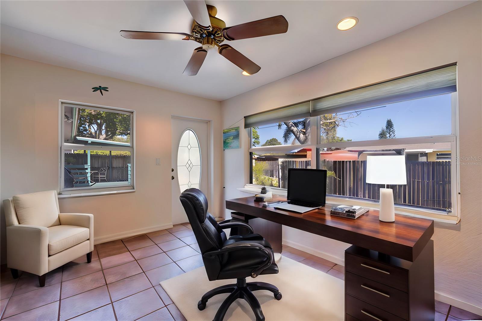 Virtually staged bonus room as a home office