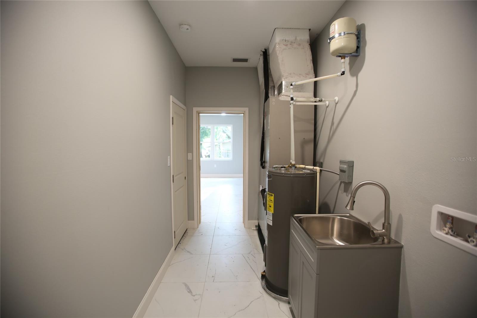 Laundry with view of air-handler