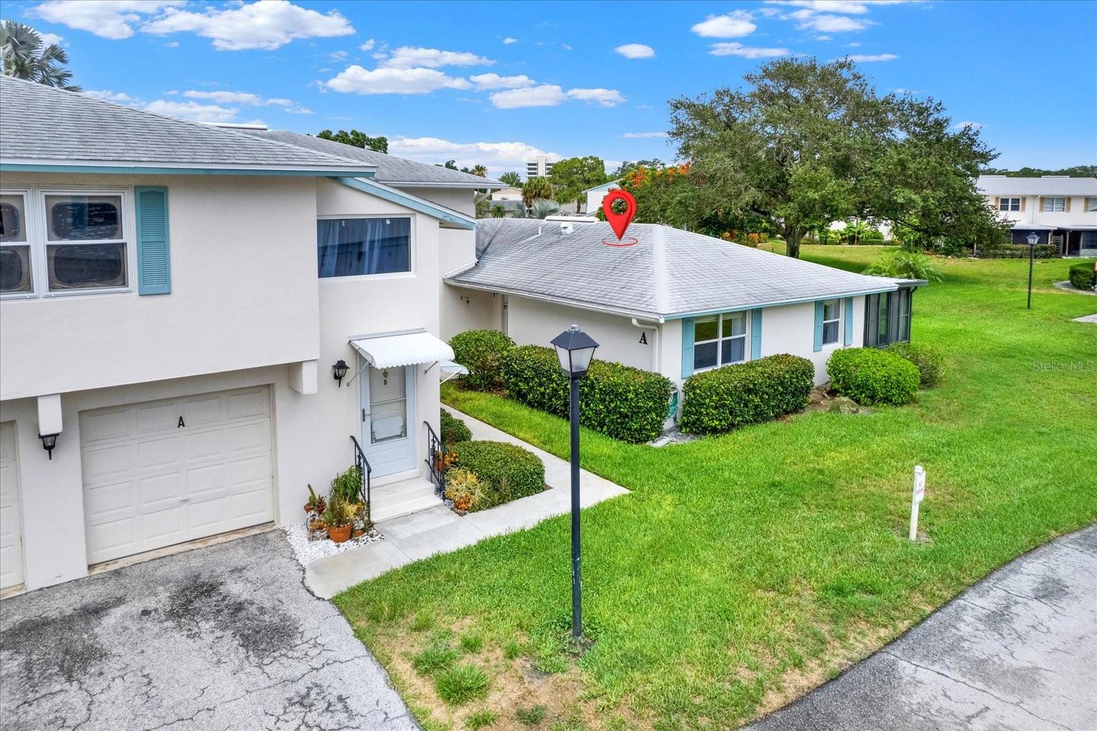 One level villa-style condo with garage and screened in lanai