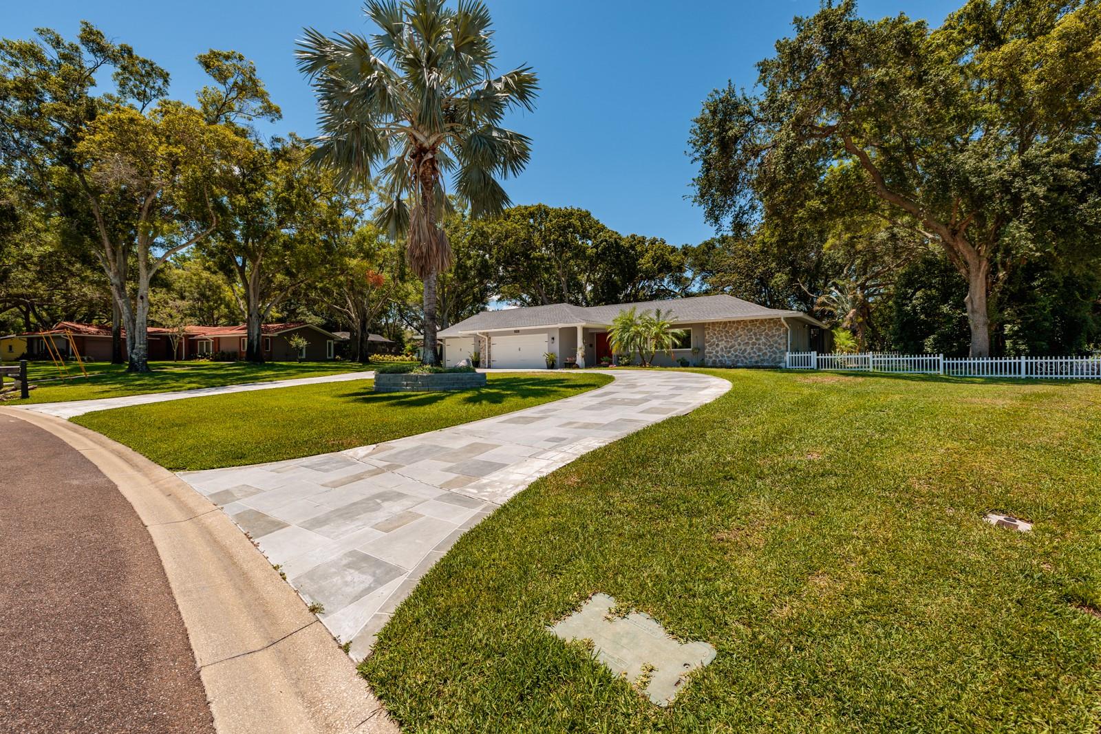 Front Yard with sweeping circle drive.