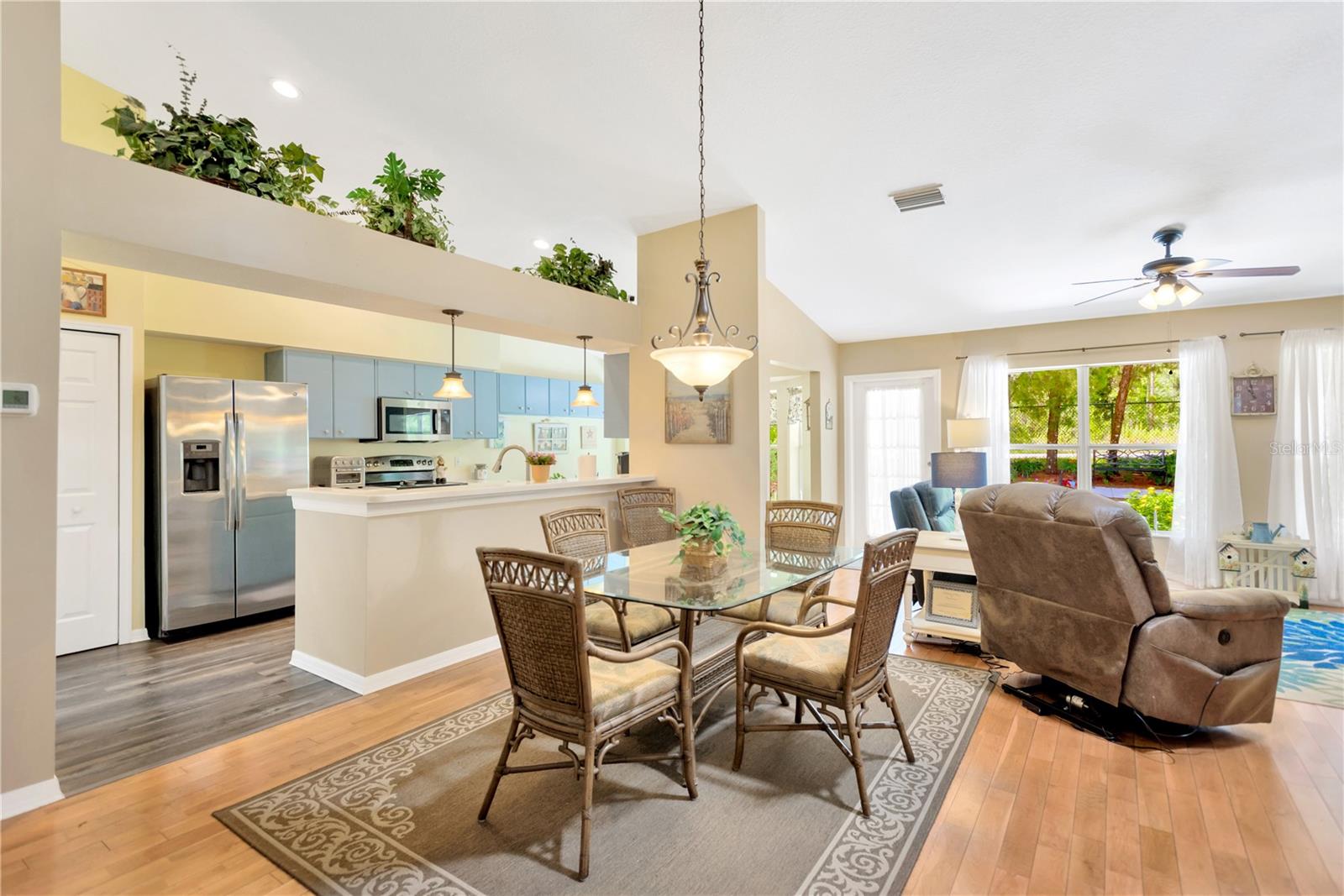 Kitchen Overlooks Entire Family & Dining Room