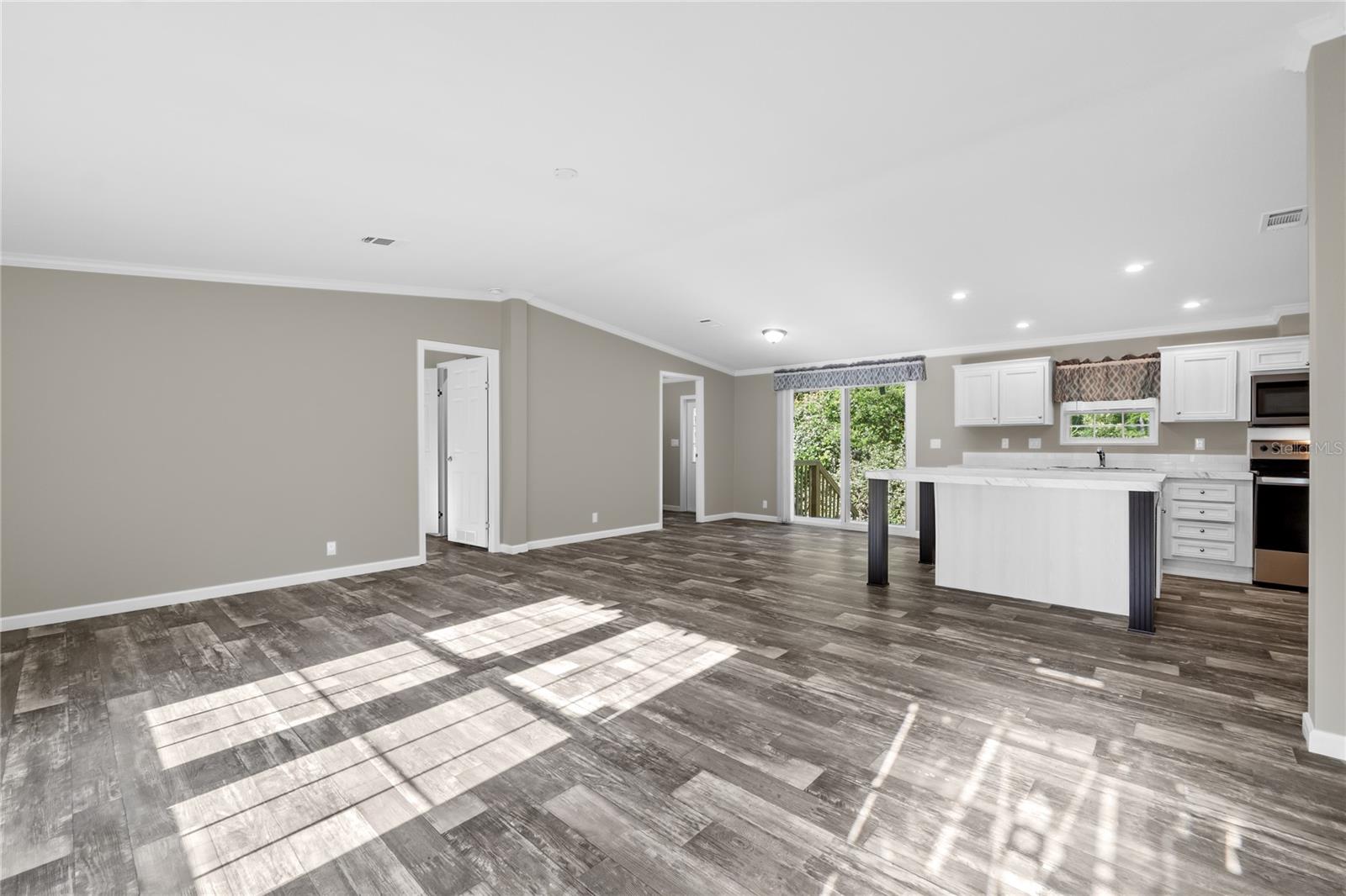 Living Room View w/ Kitchen