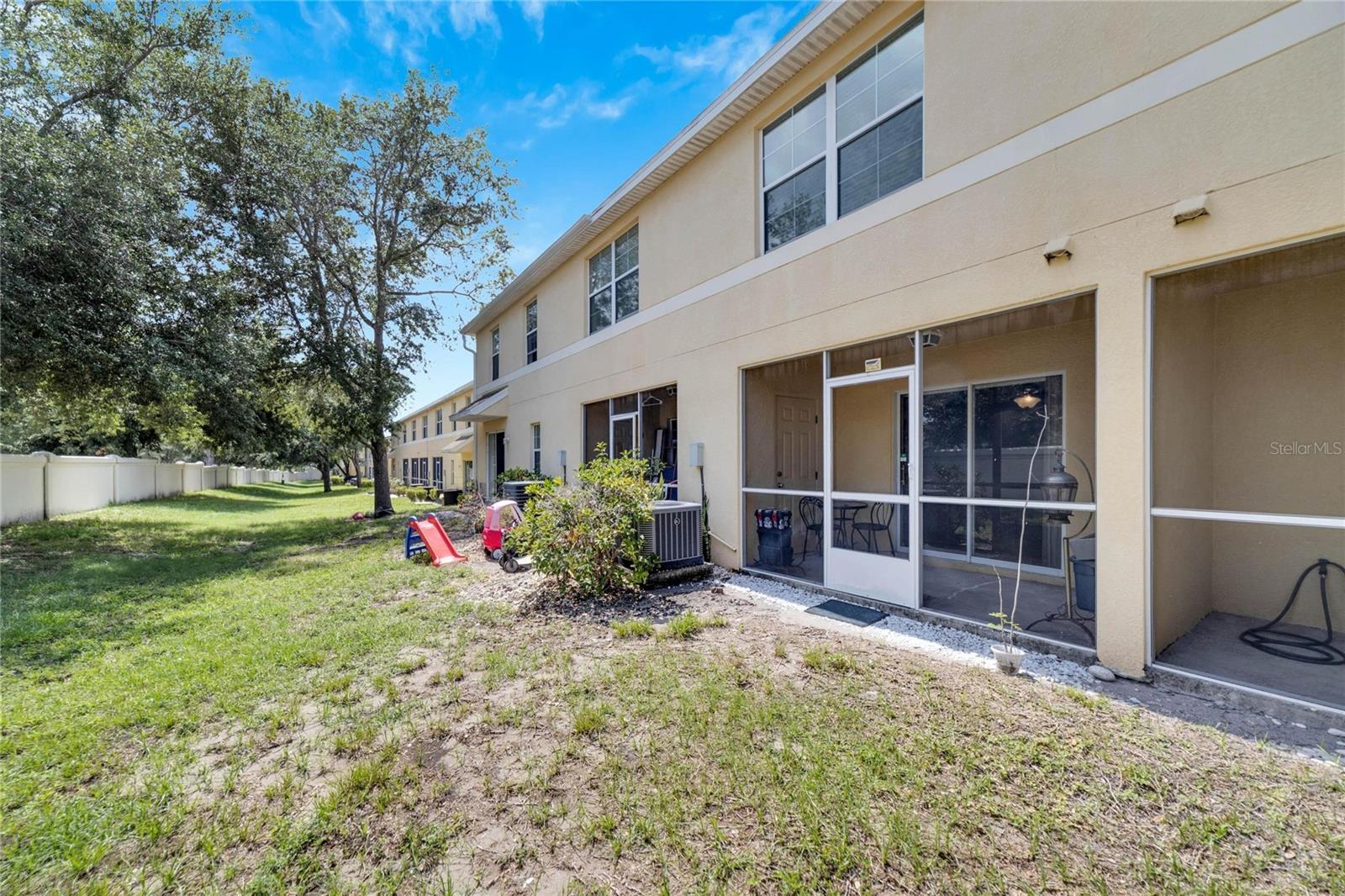 Rear of property opens to green space and no rear neighbors.