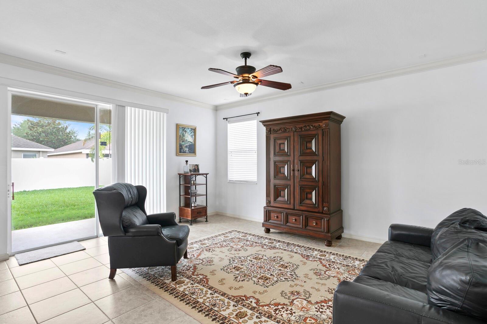 Spacious family room with sliding glass doors out to the backyard