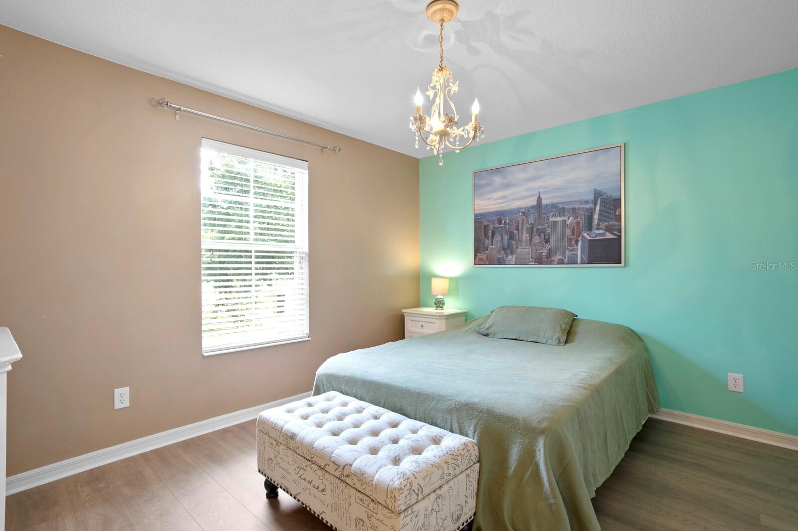 2nd bedroom with newer luxury vinyl floors