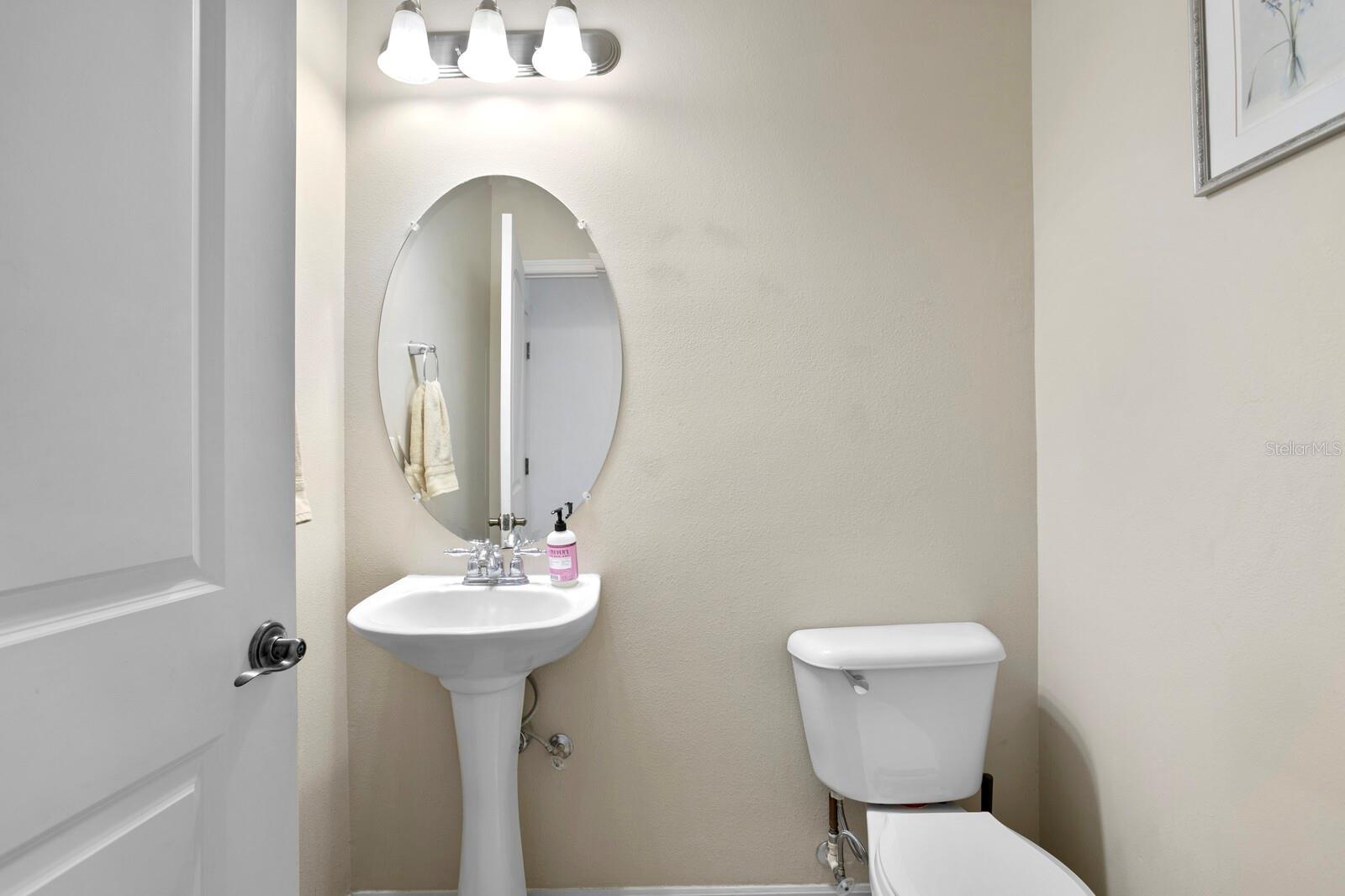 1st floor half bath with pedestal sink