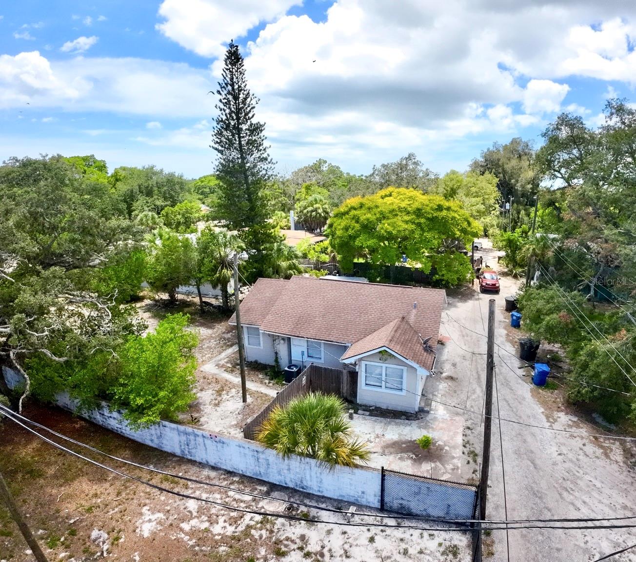 Facing West, Side of House.