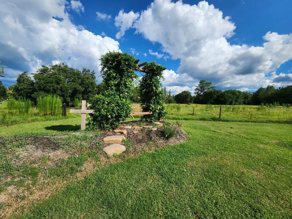 Arbor overlooking pond