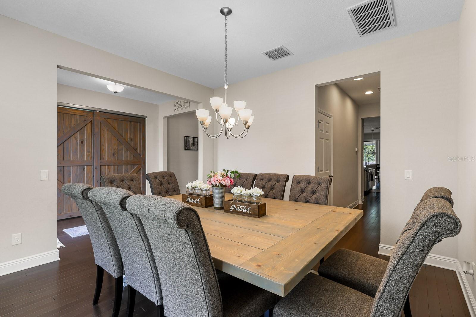 Dining Room view into entryway and butler's pantry