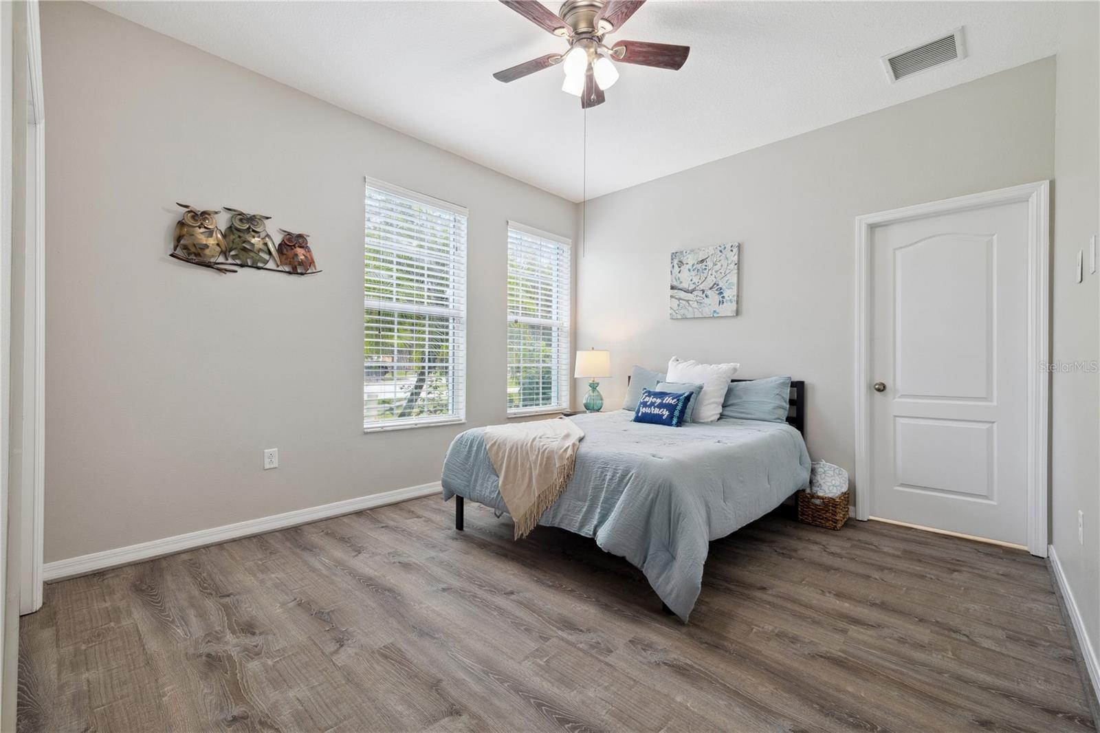 Bedroom on front of home with private bath