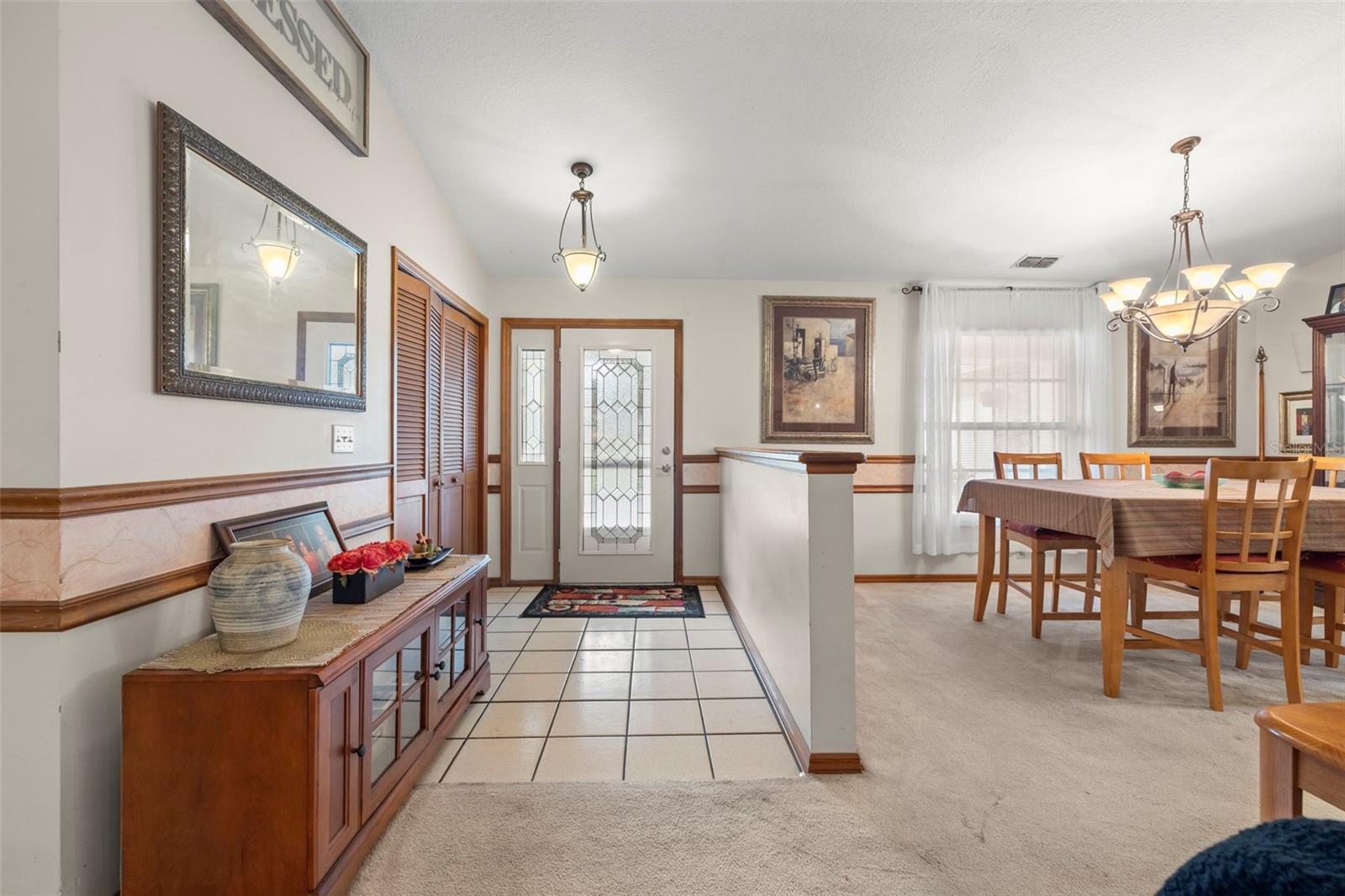 Entry Way with Front Glass Lead Door