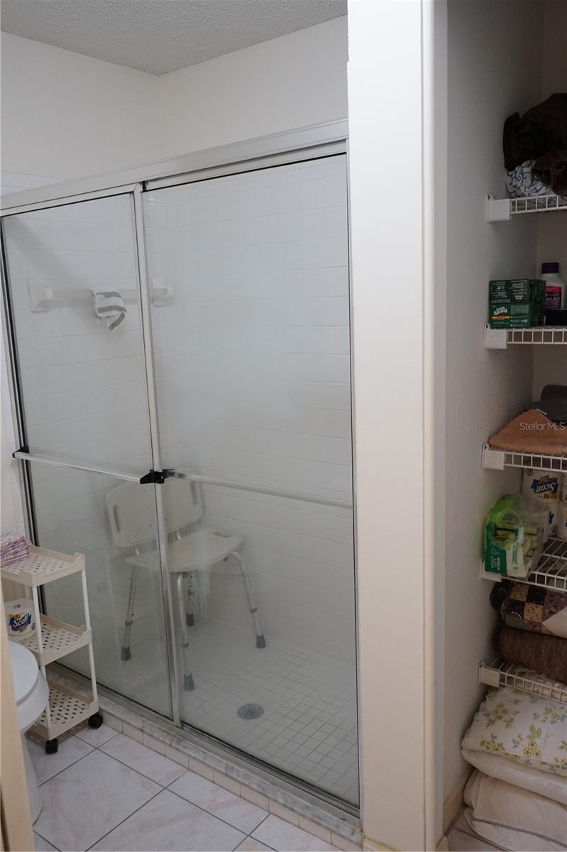 owners shower and linen closet