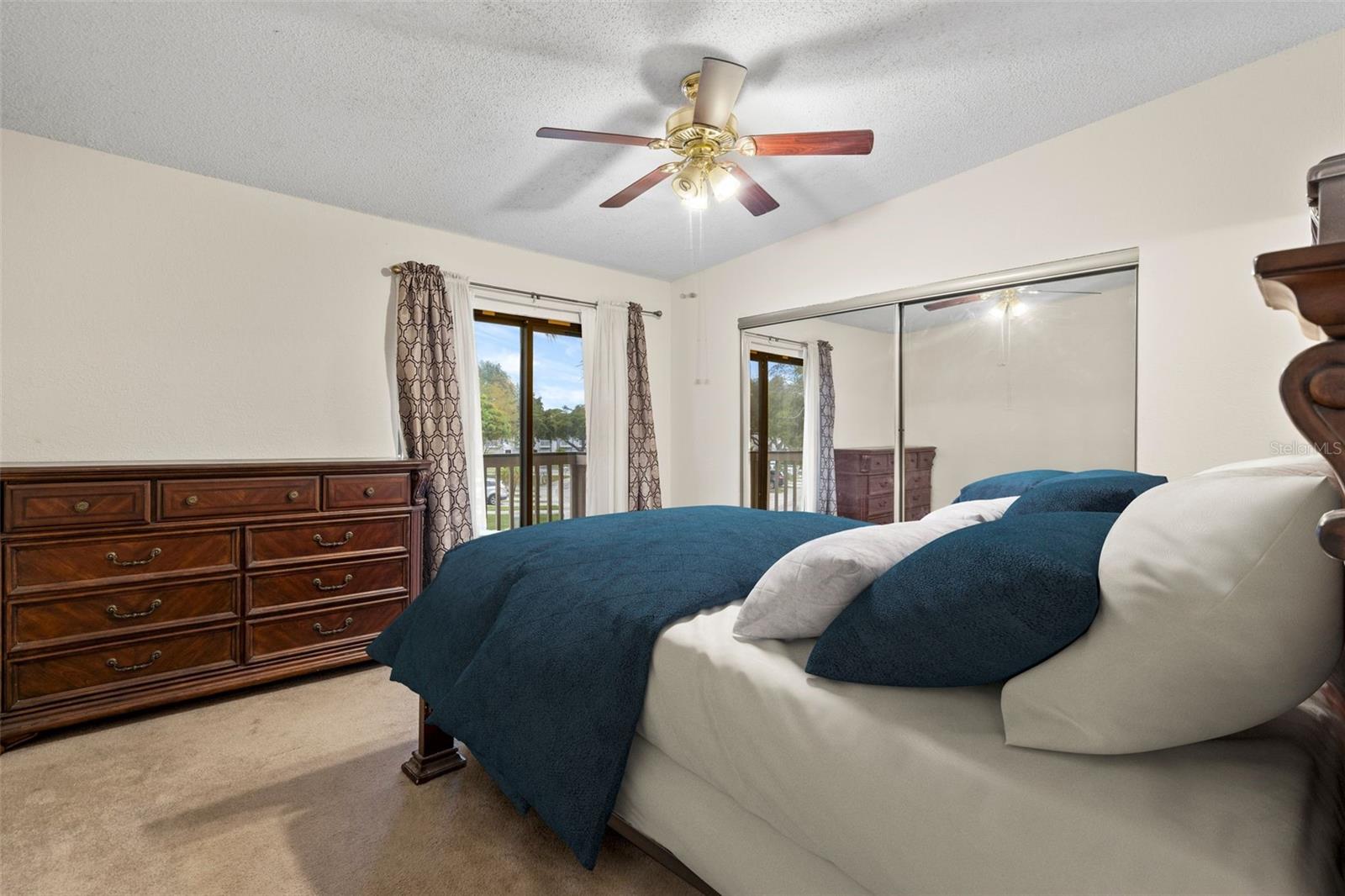 primary bedroom with private balcony