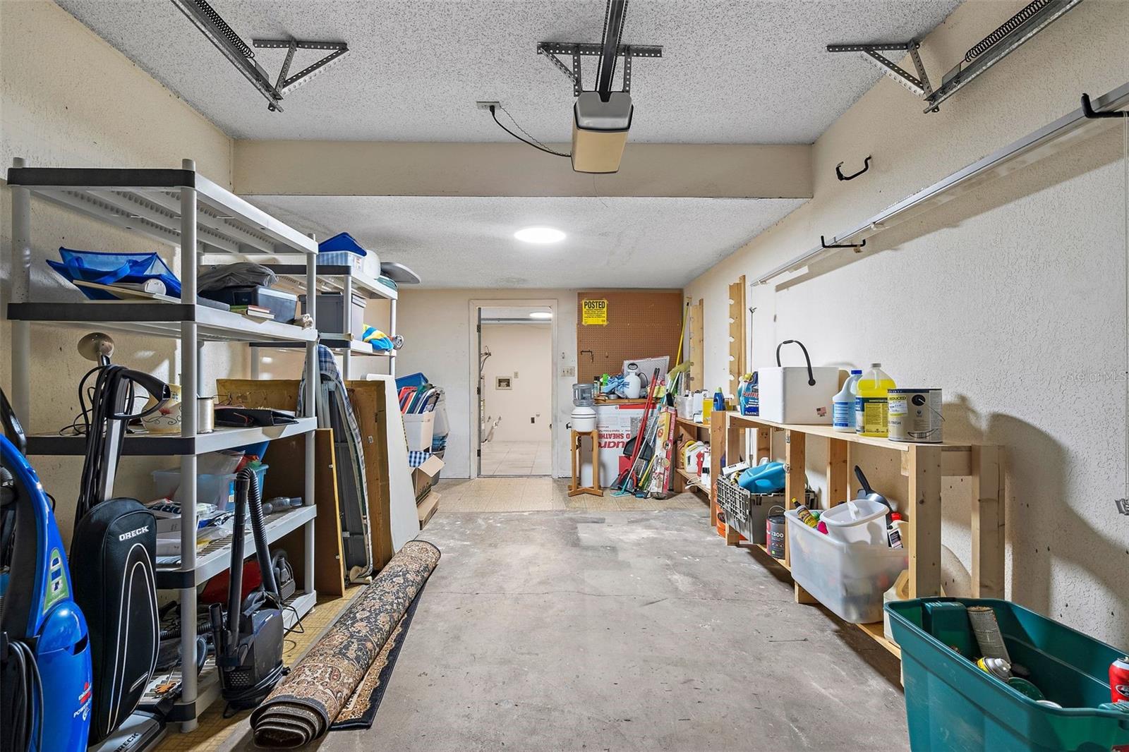 Spacious 1 car garage leading into laundry room