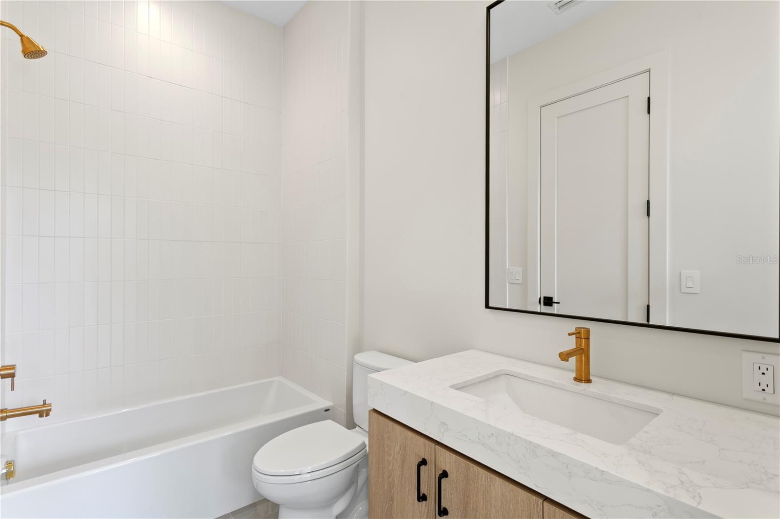 Ensuite Bath for Bed 2 and Playroom; accessible from Hallway