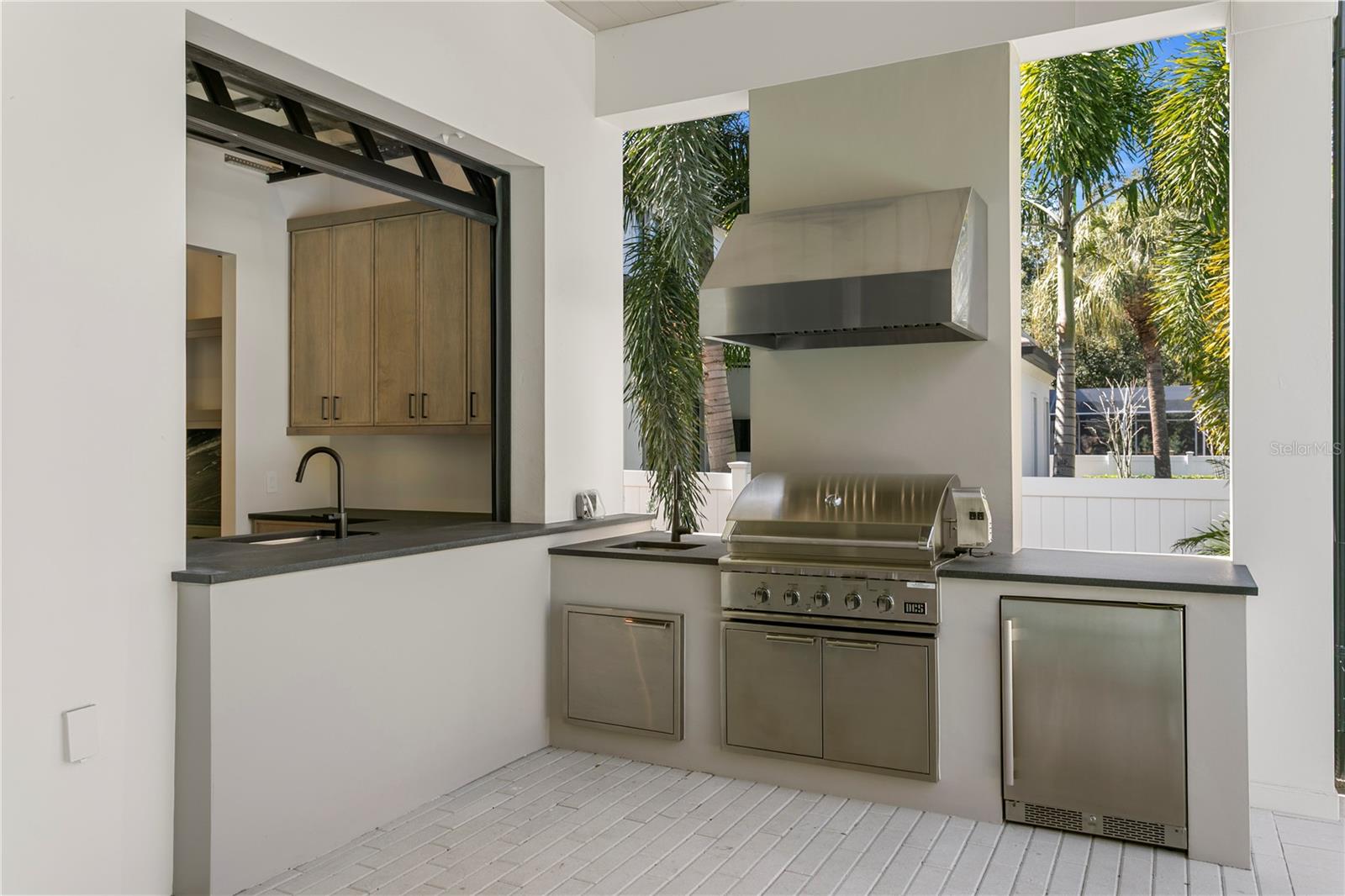 Outdoor kitchen with grill/smoker/rotisserie