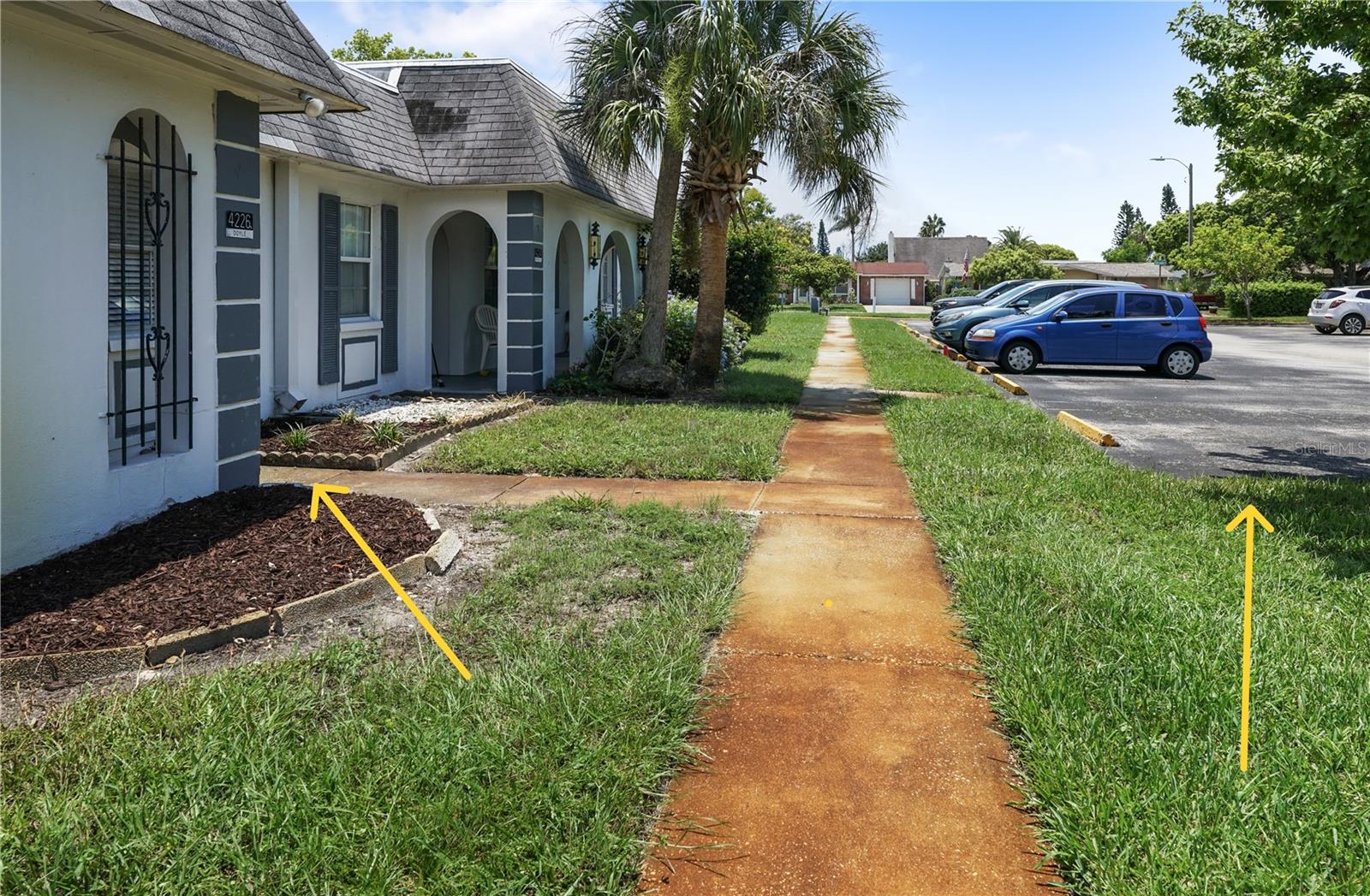 Front door and parking space