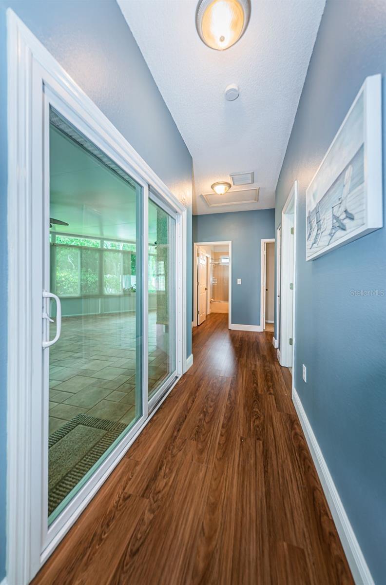 Hallway off of Family Room leading to secondary bedrooms