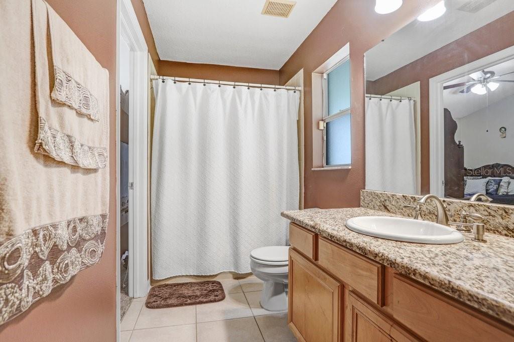 Cabana bathroom with exit to the patio